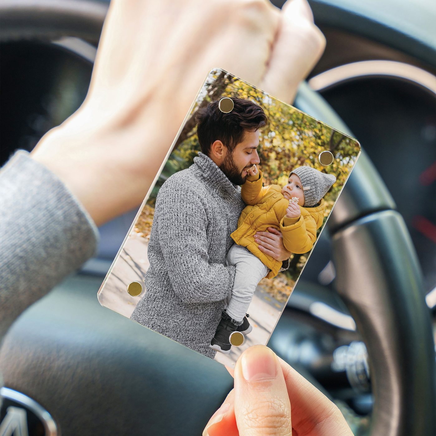 Magnetic acrylic photo frame held inside a car, manufacturer example